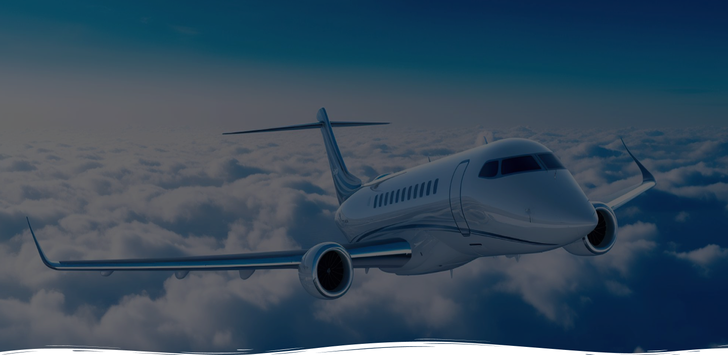 Private jet flying over clouds